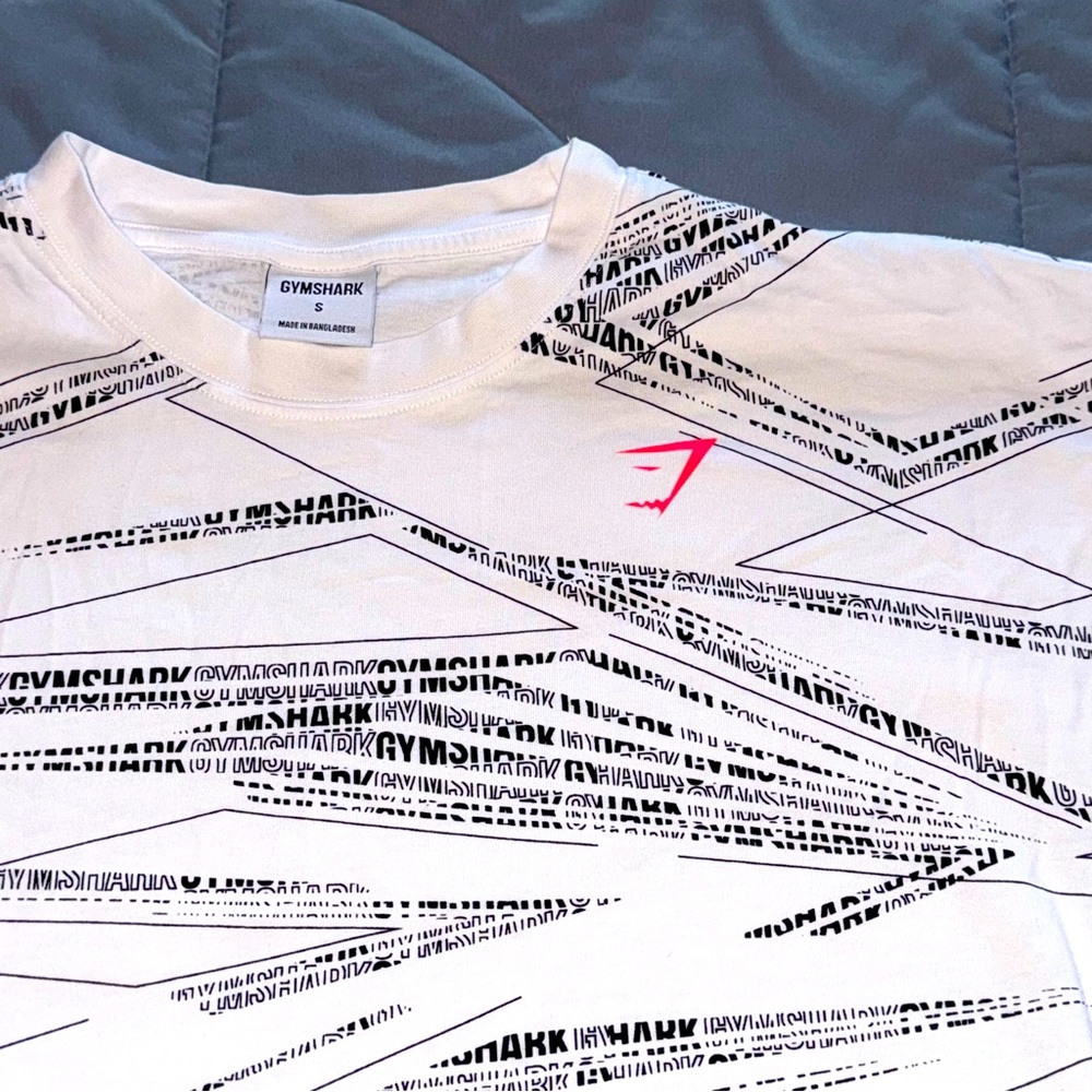 white with black and neon pink logo gymshark oversized t shirt